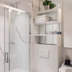 Salle de bain de la Chambre Privilège avec une douche, un lavabo et un miroir à l’Hôtel 34B