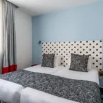 Chambre Familiale Supérieure à l’hôtel Astoria à Paris