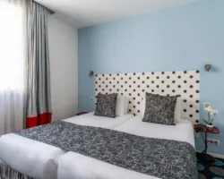 Chambre Familiale Supérieure à l’hôtel Astoria à Paris