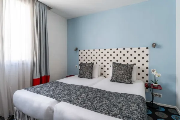 Chambre Familiale Supérieure à l’hôtel Astoria à Paris