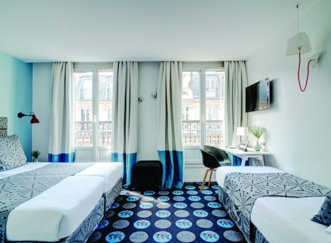 Vue de la chambre triple à l’hôtel Astoria