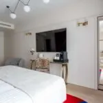 Vue d’ensemble de la chambre Supérieure Communicante Bouglione à l’hôtel Astra Opéra