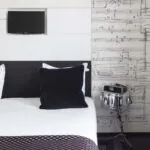 Chambre Double Supérieure, parfaite pour 1 ou 2 personnes, offrant élégance et confort pour un séjour raffiné et relaxant à l’Hôtel 123 Sébastopol