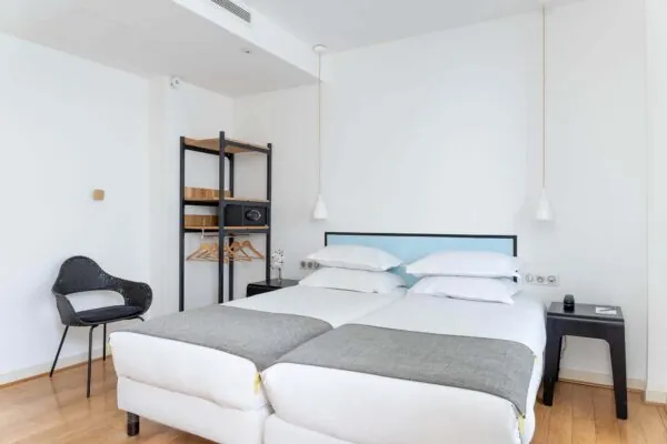 Chambre communicante de l’hôtel 3 étoiles Palm du groupe Astotel à Paris, idéale pour les familles ou groupes