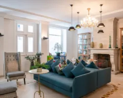 Reception area at the Malte Hotel in Paris with elegant décor, soft lighting and a warm, welcoming atmosphere